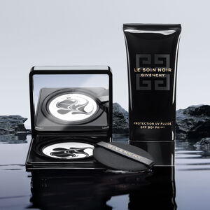View 5 - LE SOIN NOIR - The Black & White UV protector enclosed in a nomadic compact case for protection and absolute skin comfort​. GIVENCHY - 12 G - P056100