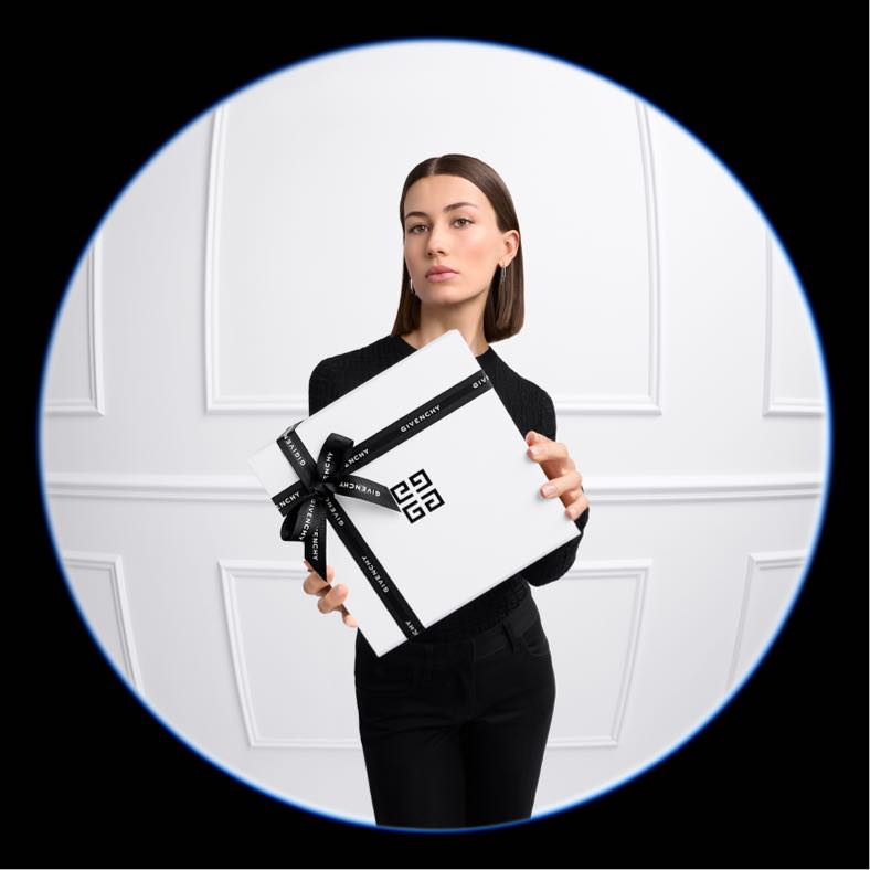 Model and couture giftboxes Givenchy